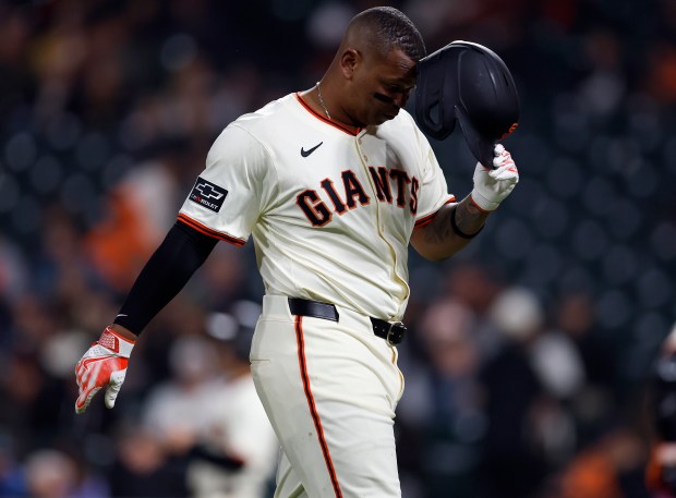 San Francisco Giants' Rafael Devers (16) heads to the dugout after grounding out against the Miami Marlins in the 10th inning at Oracle Park in San Francisco, Calif., on Wednesday, June 25, 2025. (Nhat V. Meyer/Bay Area News Group)