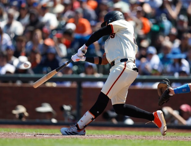 San Francisco Giants' Luis Matos (29) hits a two-run home run against the Los Angeles Dodgers in the ninth inning at Oracle Park in San Francisco, Calif., on Sunday, July 13, 2025. (Nhat V. Meyer/Bay Area News Group)