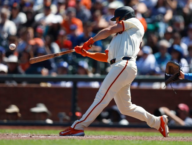 San Francisco Giants’ Matt Chapman (26) hits a single against...