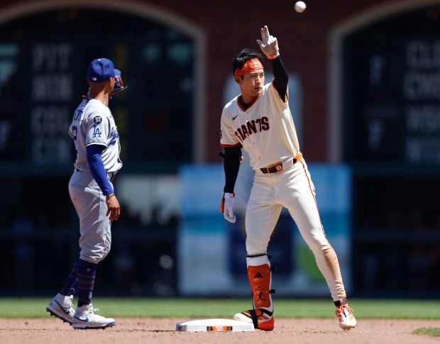 San Francisco Giants’ Jung Hoo Lee (51) celebrates his double...