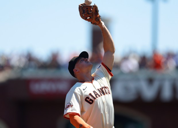 San Francisco Giants’ Matt Chapman (26) makes a catch for...