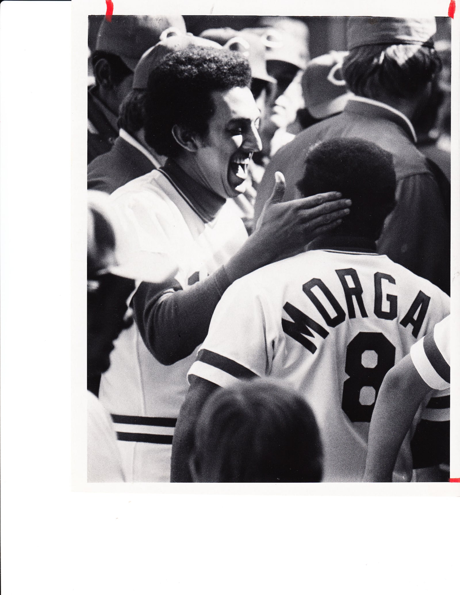 Shortstop David Concepcion greets Joe Morgan after Morgan hit a home run in the first game of the 1976 World Series at Riverfront Stadium. The Reds won the game, 5-1, against the New York Yankees.