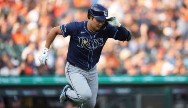 Kim Ha-seong of the Tampa Bay Rays heads to first after hitting a single against the Detroit Tigers during the clubs