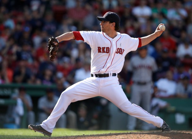 Craig Breslow of Trumbull pitching for the Red Sox. He is now the team's chief baseball officer, and he's on a roll. (AP Photo/Steven Senne)