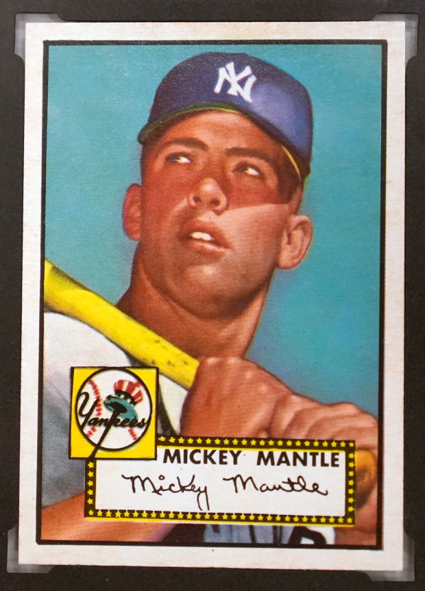 A Mickey Mantle rookie baseball card from 1952 is a rare find. (AP Photo/LM Otero)