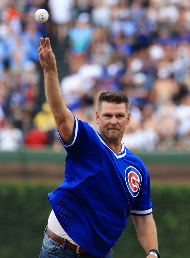 Retired Cubs pitcher Kerry Wood throws a ceremonial first pitch before a Cubs-Red Sox game on July 19, 2025, at Wrigley Field. (John J. Kim/Chicago Tribune)