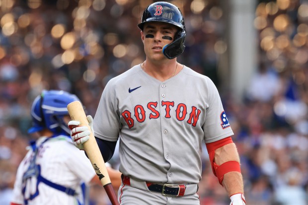 Red Sox second baseman Romy Gonzalez heads to the dugout after striking out against the Cubs in the first inning on July 19, 2025, at Wrigley Field. (John J. Kim/Chicago Tribune)