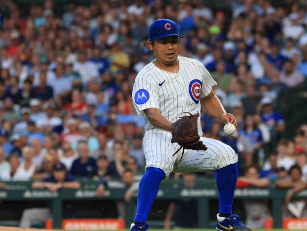 Cubs starter Shota Imanaga chases a ball hit for an infield single by Red Sox first baseman Abraham Toro in the seventh inning on July 19, 2025, at Wrigley Field. (John J. Kim/Chicago Tribune)