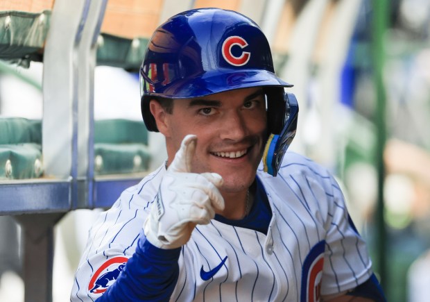 Cubs pinch hitter Matt Shaw gestures to photographers after hitting a home run in the seventh inning against the Red Sox on July 19, 2025, at Wrigley Field. (John J. Kim/Chicago Tribune)
