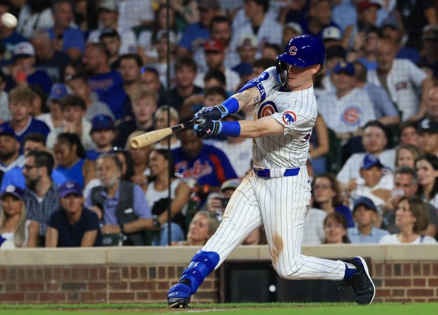 Cubs center fielder Pete Crow-Armstrong connects for a home run in the eighth inning against the Red Sox on July 19, 2025, at Wrigley Field. (John J. Kim/Chicago Tribune)
