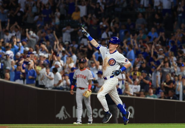 Cubs center fielder Pete Crow-Armstrong rounds the bases after hitting a home run in the eighth inning against the Red Sox on July 19, 2025, at Wrigley Field. (John J. Kim/Chicago Tribune)