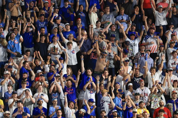 Fans celebrate a 6-0 win over the Red Sox on July 19, 2025, at Wrigley Field. (John J. Kim/Chicago Tribune)