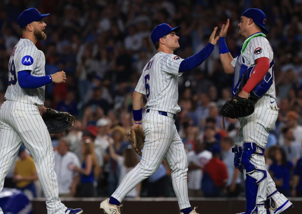 Cubs third base Matt Shaw, center, and teammates celebrate a 6-0 win over the Red Sox on July 19, 2025, at Wrigley Field. (John J. Kim/Chicago Tribune)