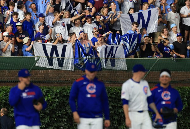 Fans celebrate a 6-0 win over the Red Sox on July 19, 2025, at Wrigley Field. (John J. Kim/Chicago Tribune)