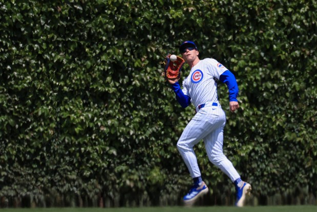 Cubs center fielder Pete Crow-Armstrong catches a fly ball by Reds second baseman Matt McLain on May 31, 2025, at Wrigley Field. (John J. Kim/Chicago Tribune)