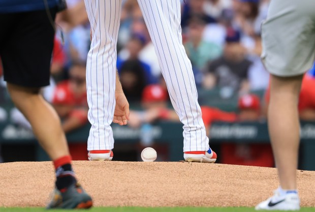 Chicago Cubs starting pitcher Matthew Boyd reaches down for the ball to start the first inning against the Cardinals at Wrigley Field on July 6, 2025, in Chicago. (John J. Kim/Chicago Tribune)