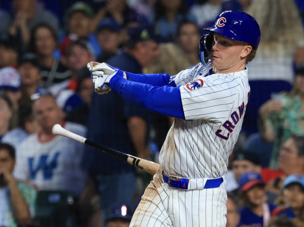 Cubs center fielder Pete Crow-Armstrong loses his bat grip in the fifth inning against the Cardinals at Wrigley Field on July 6, 2025, in Chicago. (John J. Kim/Chicago Tribune)