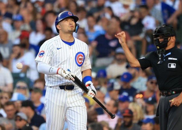 Cubs right fielder Seiya Suzuki heads to the dugout after striking out swinging in the third inning against the Guardians at Wrigley Field on July 3, 2025, in Chicago. (John J. Kim/Chicago Tribune)
