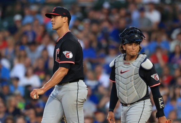 Guardians starting pitcher Joey Cantillo, left, approaches the mound before being taken out of the game in the fourth inning against the Cubs at Wrigley Field on July 3, 2025, in Chicago. (John J. Kim/Chicago Tribune)