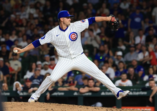 Cubs pitcher Chris Flexen throws in the tenth inning against the Guardians at Wrigley Field on July 3, 2025, in Chicago. (John J. Kim/Chicago Tribune)