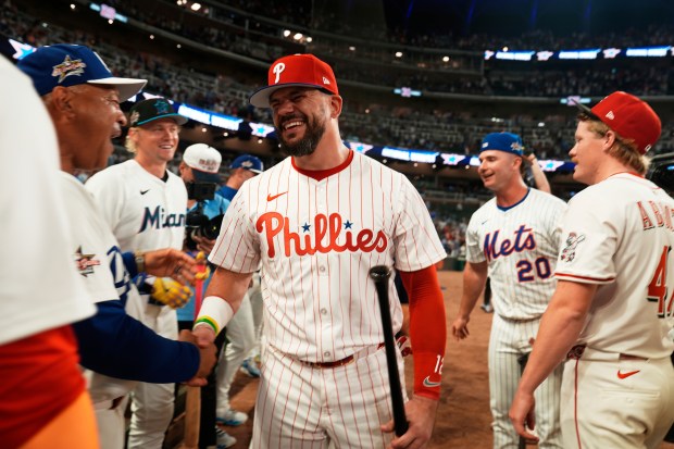 The Phillies' Kyle Schwarber celebrates after winning the tiebreaker in the MLB All-Star Game on July 15, 2025, in Atlanta. (AP Photo/Brynn Anderson)