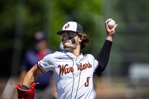 Lincoln-Way West's Conor Essenburg (8) pitches against Sandburg during the Class 4A Sandburg Regional final in Orland Park on Saturday, May 25, 2024. (Vincent D. Johnson/for the Daily Southtown)