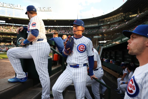Chicago Cubs center fielder Pete Crow-Armstrong (center) waits to take the field for a game against the Cleveland Guardians at Wrigley Field in Chicago on July 2, 2025. (Chris Sweda/Chicago Tribune)