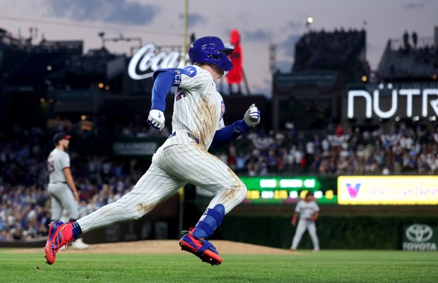 Chicago Cubs center fielder Pete Crow-Armstrong sprints around the bases en route to a run-scoring triple in the fourth inning of a game against the Cleveland Guardians at Wrigley Field in Chicago on July 2, 2025. (Chris Sweda/Chicago Tribune)