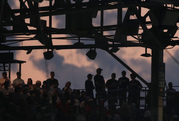 Fans take in a game between the Chicago Cubs and the Cleveland Guardians in the fifth inning at Wrigley Field in Chicago on July 2, 2025. (Chris Sweda/Chicago Tribune)
