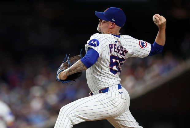 Chicago Cubs relief pitcher Ryan Pressly (55) delivers to the Cleveland Guardians in the sixth inning of a game at Wrigley Field in Chicago on July 2, 2025. (Chris Sweda/Chicago Tribune)