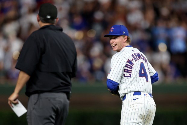 Chicago Cubs center fielder Pete Crow-Armstrong has a laugh with an umpire in the ninth inning of a game against the Cleveland Guardians at Wrigley Field in Chicago on July 2, 2025. (Chris Sweda/Chicago Tribune)