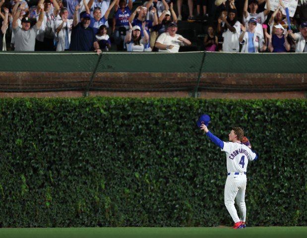 Chicago Cubs center fielder Pete Crow-Armstrong (4) celebrates toward fans in the bleachers after a Cubs victory over the Cleveland Guardians at Wrigley Field in Chicago on July 2, 2025. (Chris Sweda/Chicago Tribune)