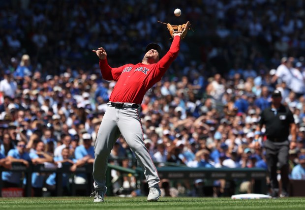 Red Sox third baseman Alex Bregman catches a pop-up in the first inning against the Cubs on July 18, 2025, at Wrigley Field. (Chris Sweda/Chicago Tribune)