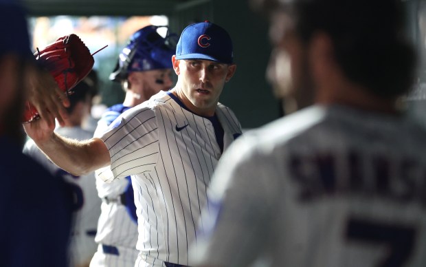Chicago Cubs starting pitcher Matthew Boyd is congratulated by his teammates in the dugout after closing out the Kansas City Royals with a strikeout to end the seventh inning of a game at Wrigley Field in Chicago on July 22, 2025. (Chris Sweda/Chicago Tribune)