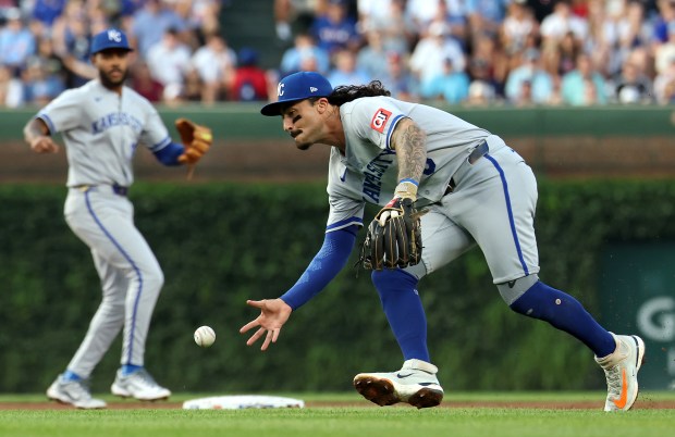 Kansas City Royals second baseman Jonathan India fields a ball that went for a run-scoring single for Chicago Cubs third baseman Matt Shaw in the second inning of a game at Wrigley Field in Chicago on July 22, 2025. (Chris Sweda/Chicago Tribune)
