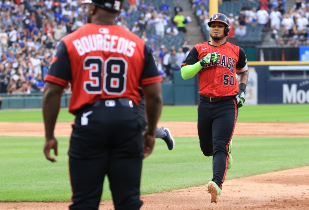 White Sox second baseman Lenyn Sosa heads back to first base after hitting a two-run single against the Cubs in the first inning on July 25, 2025, at Rate Field. (John J. Kim/Chicago Tribune)
