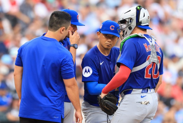 Cubs starting pitcher Shota Imanaga takes a meeting on the mound in the second inning against the White Sox on July 25, 2025, at Rate Field. (John J. Kim/Chicago Tribune)
