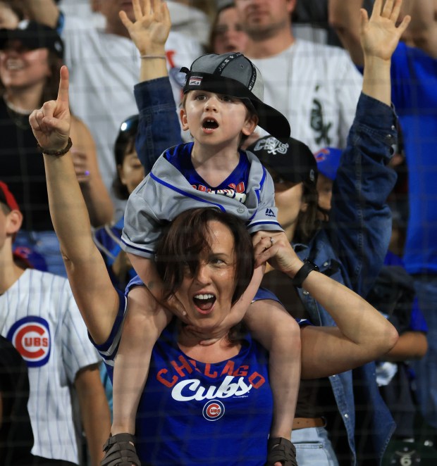 A child wears a rally cap during the seventh-inning stretch of a White Sox-Cubs game on July 25, 2025, at Rate Field. (John J. Kim/Chicago Tribune)