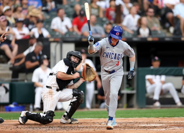White Sox catcher Kyle Teel reacts as Cubs center fiielder Pete Crow-Armstrong throws his bat to the ground as he flies out to end the top of the fourth inning on July 26, 2025, at Rate Field. (Chris Sweda/Chicago Tribune)