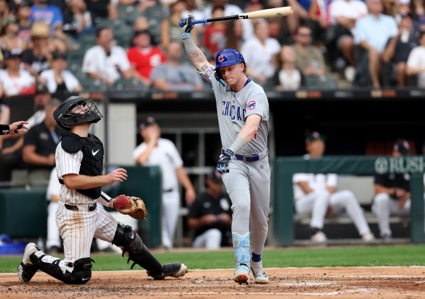 White Sox catcher Kyle Teel looks skyward as Cubs center fiielder Pete Crow-Armstrong reacts as he flies out to end the top of the fourth inning on July 26, 2025, at Rate Field. (Chris Sweda/Chicago Tribune)