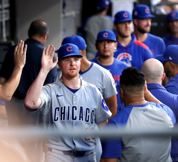 Cubs starter Cade Horton is congratulated by teammates in the dugout after being taken out of the game in the seventh inning against the White Sox on July 26, 2025, at Rate Field. (Chris Sweda/Chicago Tribune)