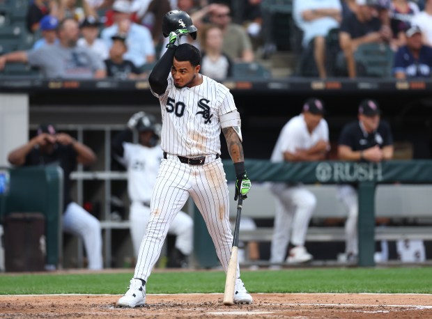 White Sox second baseman Lenyn Sosa wipes off his face during an at-bat in the fifth inning against the Cubs on July 26, 2025, at Rate Field. (Chris Sweda/Chicago Tribune)