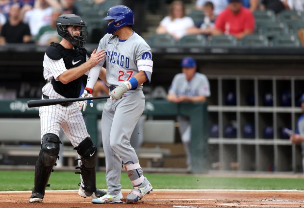 White Sox catcher Kyle Teel makes sure Cubs designated hitter Seiya Suzuki is OK after Teel tagged him out on a dropped third strike in the first inning on July 26, 2025, at Rate Field. (Chris Sweda/Chicago Tribune)