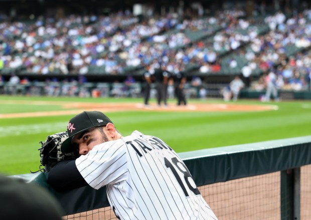 White Sox right fielder Mike Tauchman leans on the railing of the dugout before taking the field for a game against his former team, the Cubs, on July 26, 2025, at Rate Field. (Chris Sweda/Chicago Tribune)