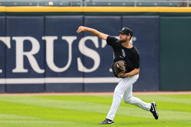 White Sox pitcher Adrian Houser warms up before a game against the Phillies at Rate Field on July 30, 2025, in Chicago. (John J. Kim/Chicago Tribune)