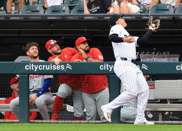 White Sox first baseman Miguel Vargas catches a pop from designated hitter Phillies Kyle Schwarber for an out near the Phillies dugout in the first inning at Rate Field on July 30, 2025, in Chicago. (John J. Kim/Chicago Tribune)