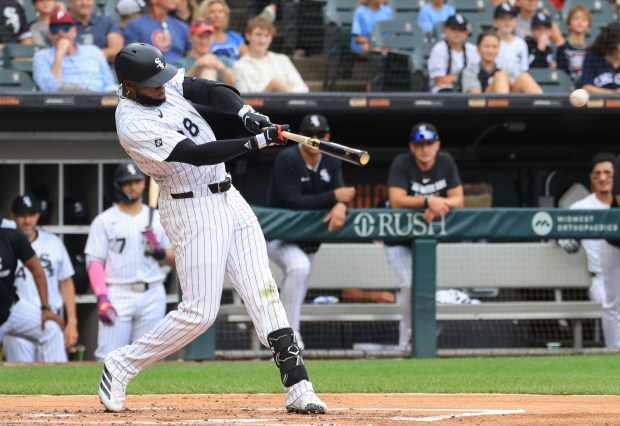 White Sox center fielder Luis Robert Jr. connects on a single in the second inning against the Phillies at Rate Field on July 30, 2025, in Chicago. (John J. Kim/Chicago Tribune)