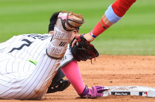 White Sox catcher Edgar Quero beats the tag from Phillies second baseman Bryson Stott for a double in the second inning at Rate Field on July 30, 2025, in Chicago. (John J. Kim/Chicago Tribune)