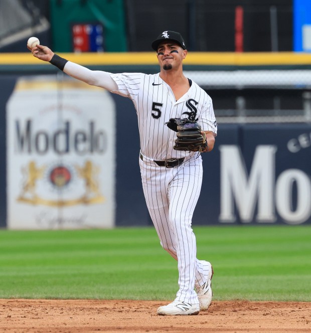White Sox third baseman Josh Rojas throws to first on a grounder from Phillies catcher Rafael Marchán for an out in the fifth inning at Rate Field on July 30, 2025, in Chicago. (John J. Kim/Chicago Tribune)