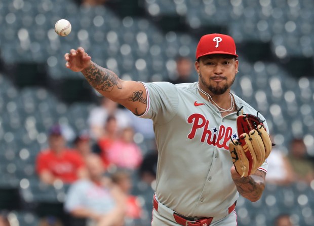 Phillies starting pitcher Taijuan Walker throws to first base in the fifth inning against the White Sox at Rate Field on July 30, 2025, in Chicago. (John J. Kim/Chicago Tribune)